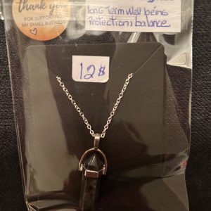 Dark grey crystal well being , calming,protection, balance, align